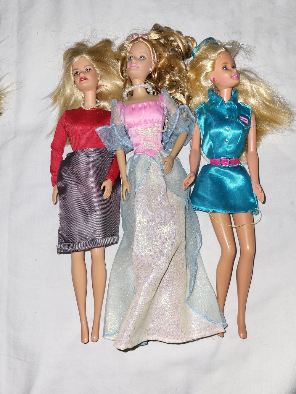 3 Barbies